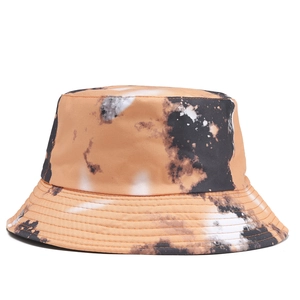 Close-up of colorful orange and black tie-dye bucket hat with detailed stitching on brim