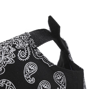 Fashionable baseball cap with black and white paisley print and adjustable velcro strap
