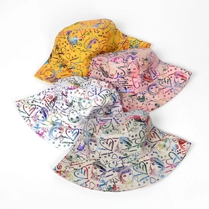 Fashionable graffiti canvas bucket hats in various colors for sun protection and style