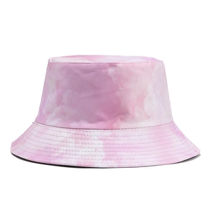 Pink tie-dye bucket hat for men and women featuring a colorful cloud-like graffiti pattern