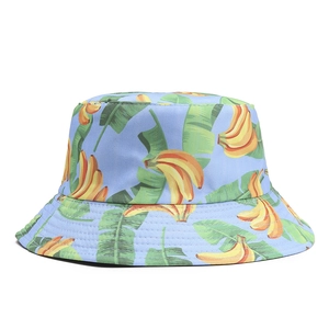 Detail of blue bucket hat with yellow banana print and reinforced stitching seams