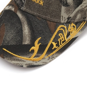 Detailed close-up of Duck embroidery and camouflage pattern on the baseball cap