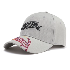 Close-up of gray twill baseball cap with 3D black calligraphy and swirl embroidery