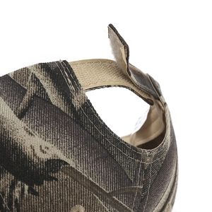 Rear view of camouflage baseball cap featuring adjustable velcro strap and canvas fabric