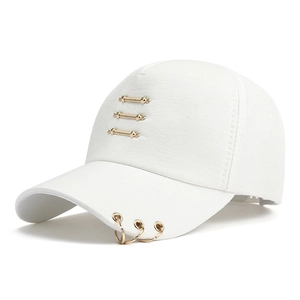 Detail of white cotton baseball cap with triple gold metal bars and side rings decor