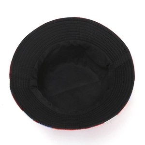 Inside view of black unisex bucket hat with red trim and premium stitching details
