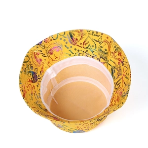 Detail of yellow graffiti bucket hat with colorful love prints and inner sweatband