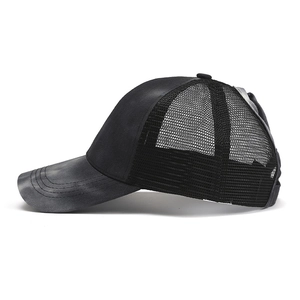 Detail view of the tie-dye gradient baseball cap with breathable mesh back and frayed edge