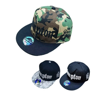 Detailed macro view of three snapback caps with Compton 3D embroidery and flat brims