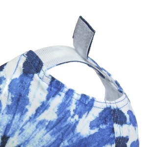Blue and white tie-dye cotton baseball cap featuring an adjustable velcro back closure