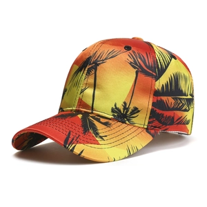 Detail of satin baseball cap with sunset gradient and black tropical palm tree embroidery