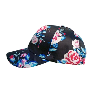 Womens floral baseball cap with red roses and blue leaves on black curved brim hat