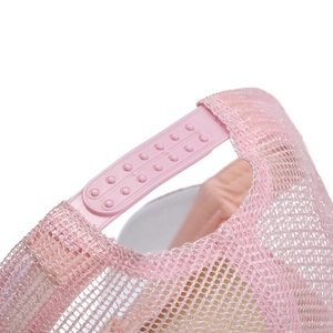 Detail of pink mesh baseball cap with adjustable snapback closure and woven texture