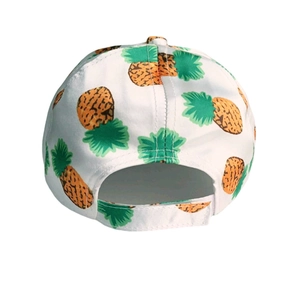 Detailed back view of white baseball cap with pineapple print and adjustable strap