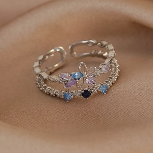 Detail of adjustable silver double ring featuring colorful marquise floral zircon stones