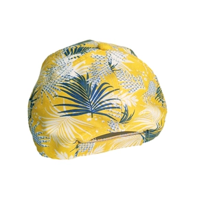 Detail view of the adjustable back closure on a yellow tropical palm leaf baseball cap