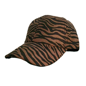 Close-up detail of the brown zebra striped pattern on a structured cotton baseball cap