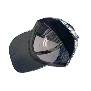 Detail view of floral baseball cap interior with black sweatband and breathable vents