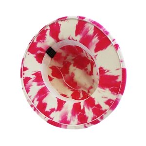 Detail view of tie-dye fedora hat interior showing sweatband and care label