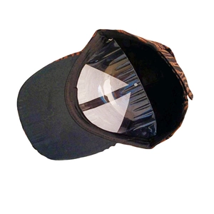 Tiger pattern baseball cap with a black curved brim and a structured animal print crown