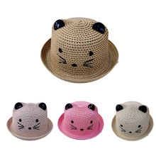 Détail montrant les différents coloris de chapeaux de paille enfant avec oreilles de chat