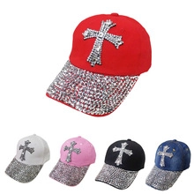 Detail showing five color variants of baseball caps with rhinestone cross and brim