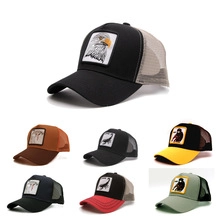 Detail of breathable mesh trucker hats with animal patches like Eagle and Bull