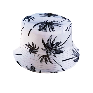 White bucket hat with black coconut tree prints for summer beach sun protection