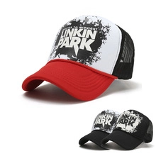 Detail of Linkin Park baseball caps featuring mesh back and splatter art design