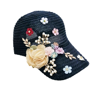 Navy blue breathable knit baseball cap with floral embroidery and pearl accents