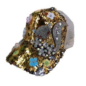 Sparkly gold sequin baseball cap featuring rhinestone squirrel and colorful floral accents
