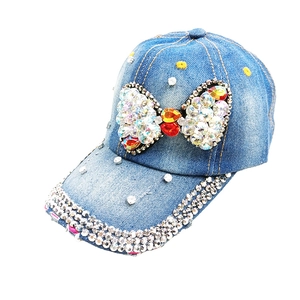 Denim baseball cap with sparkling rhinestone bow and crystal-studded brim for women