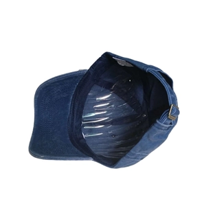 Vintage navy blue washed cotton baseball cap with adjustable strap and metal buckle