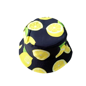Women summer bucket hat with tropical lemon print on black fabric for sun protection