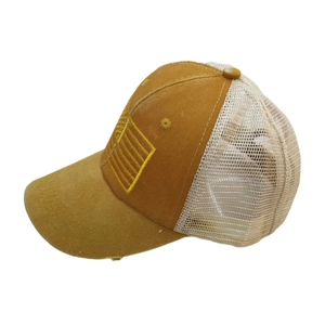 Mustard yellow vintage trucker hat with American flag embroidery and white mesh back