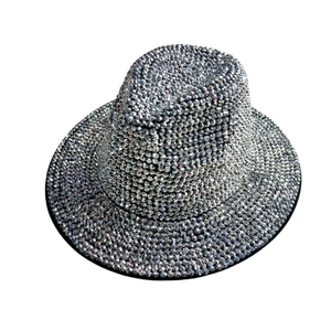 Close-up of a silver rhinestone-studded fedora hat with a brilliant sparkling finish