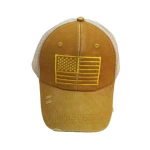 Distressed vintage trucker hat with yellow American flag embroidery and breathable mesh
