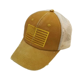 Vintage mustard yellow trucker hat with American flag embroidery and distressed brim