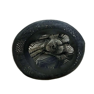 Detail view of woven sun hat interior with sweatband and knit pattern texture