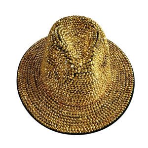 Detailed top view of a gold rhinestone-encrusted wool fedora hat with metallic finish