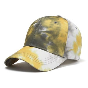 Unisex tie-dye baseball cap in yellow and grey colors shown from a 45-degree angle