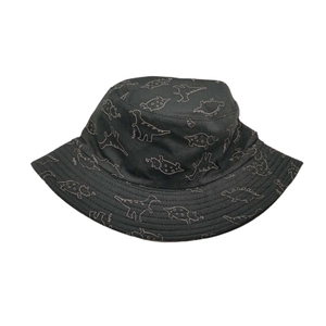 Detail view of black canvas bucket hat with white dinosaur patterns and Roar text print