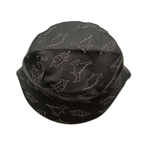 Close-up of waterproof black bucket hat with all-over white dinosaur pattern print