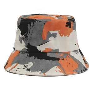 Chapeau bob à motif graffiti orange et noir pour la protection solaire en plein air