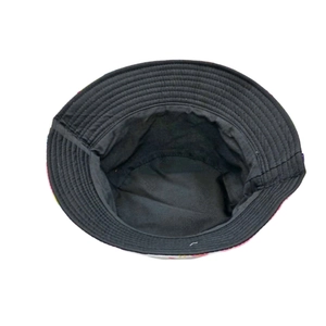 Tie-dye fashion bucket hat for women with colorful patterns and black lining for sun protection