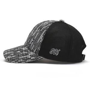 Side view of mesh baseball cap with silver sequins and white SH letter embroidery
