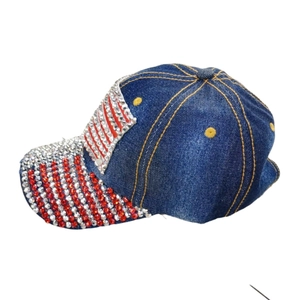 Denim baseball cap with sparkling American flag rhinestone pattern and yellow stitching
