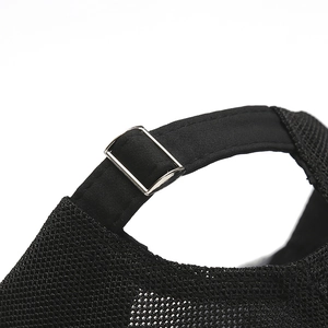 Close-up of adjustable silver metal buckle and black mesh fabric on baseball cap