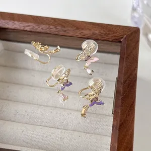 Boucles d'oreilles clips papillon avec zircons, émail coloré et gouttes de cristal