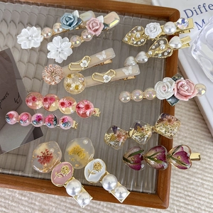 Vintage handmade resin flower hair clips set with dried roses and faux pearls